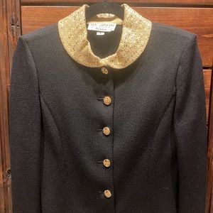 St. John black knit top. Gorgeous detail at collar and cuffs.